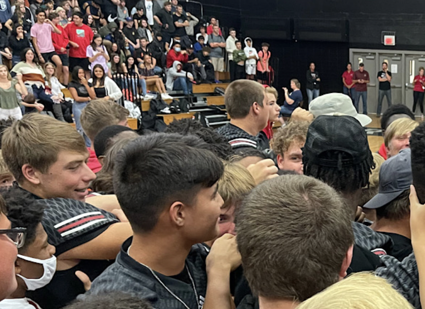 High school students in a gymnasium at a celebration