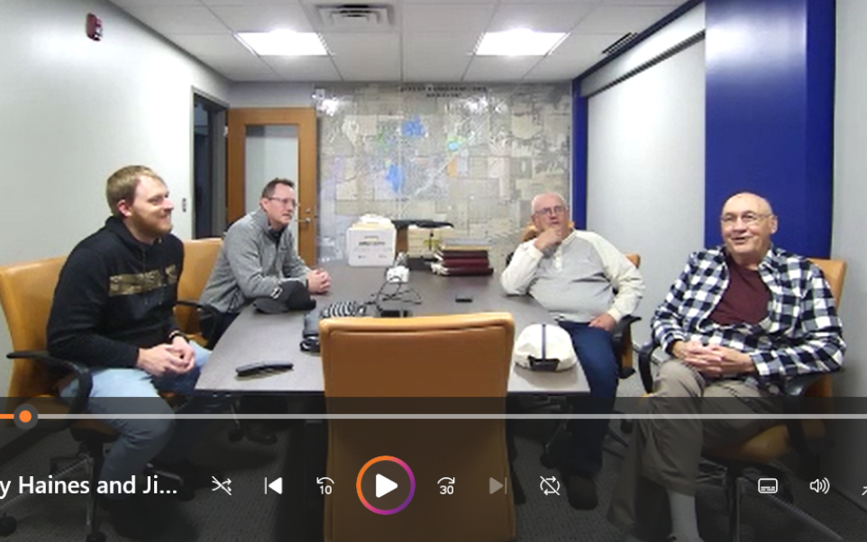 Group of men in a conference room