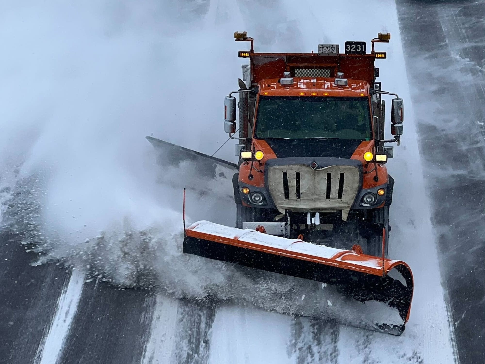 snow plow on highway